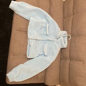 A furry baby blue Jacket size small
